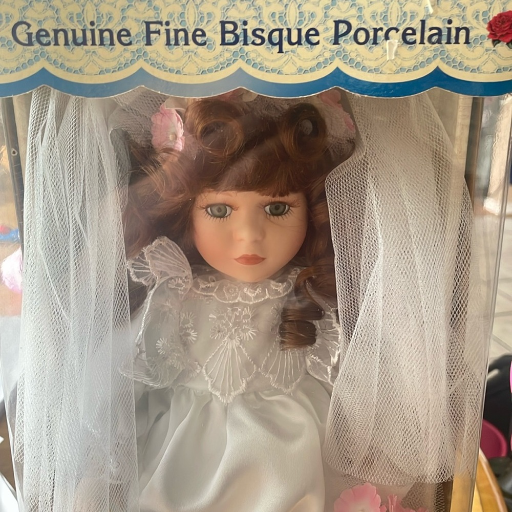 New bisque porcelain doll